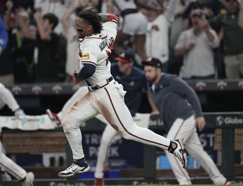 Acuña becomes first 40-70 player, Albies lifts Braves over Cubs 6-5 in 10 innings